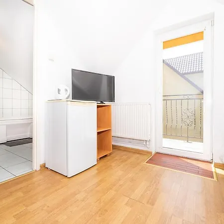 Habitación en casa particular Irys Pokoje Goscinne Darłowo